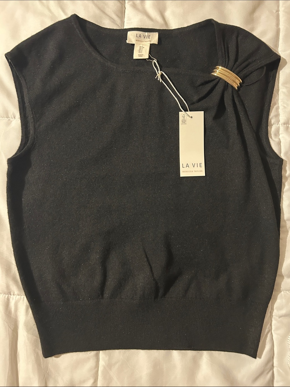 LA VIE Sleeveless Black Knit Top with Gold Shoulder Accent